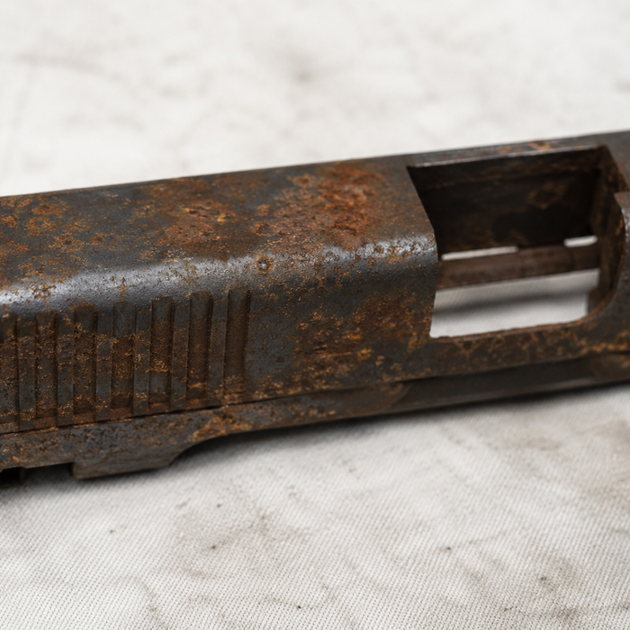 Rust on firearm slide and metal components